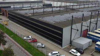 Drone image largest BIPV facade on an industrial building 