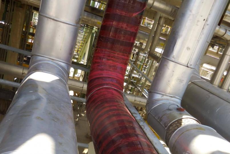 Technology_oil_gas_fabric_maintenance_revowrap_carbontech_wrap_red_pipe